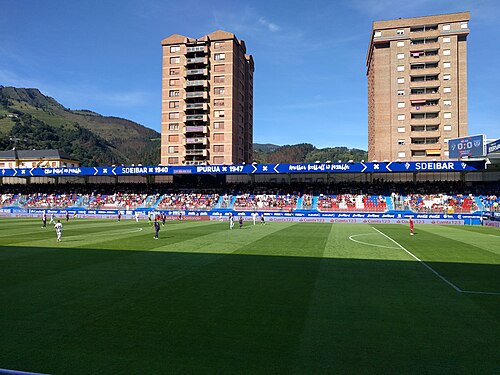 Players contesting the ball during a Spanish league match